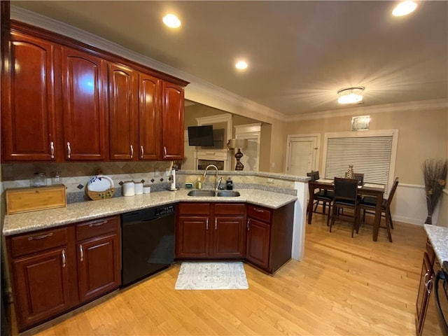 1162 Mason Lee, Loganville, GA 30052 - kitchen featuring a peninsula, a sink, light wood-type flooring, backsplash, and black dishwasher