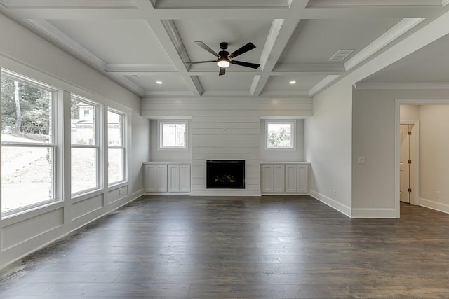 unfurnished living room featuring a large fireplace, dark wood-type flooring, coffered ceiling, and baseboards