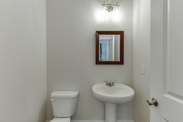 half bathroom with toilet