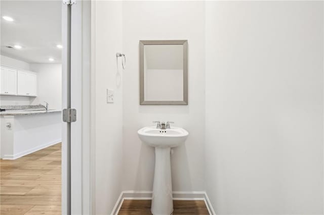 bathroom featuring hardwood / wood-style floors