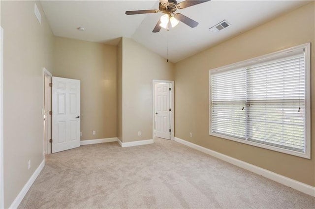 5060 Windcrest Ln, Alpharetta, GA 30022 - unfurnished room featuring light colored carpet, vaulted ceiling, and ceiling fan
