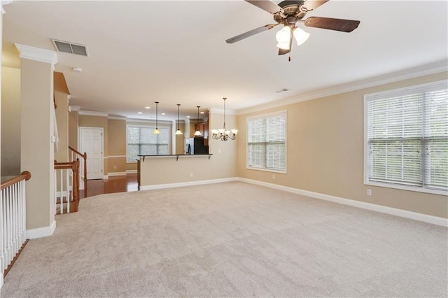 5060 Windcrest Ln, Alpharetta, GA 30022 - unfurnished living room featuring ornamental molding, light carpet, a chandelier, ceiling fan, and recessed lighting