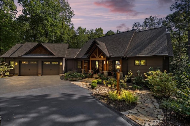 craftsman house featuring a garage