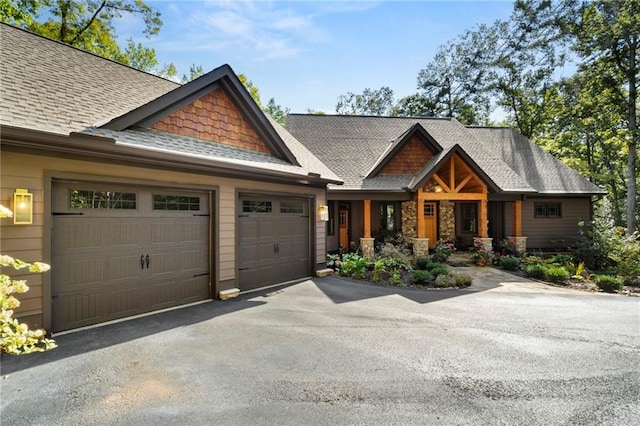 craftsman inspired home featuring a garage