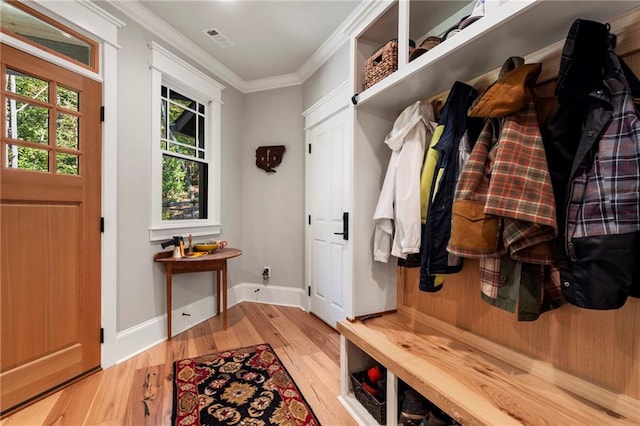 mudroom featuring ornamental molding and light hardwood / wood-style flooring