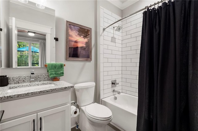 full bathroom with shower / bath combo with shower curtain, ornamental molding, vanity, and toilet