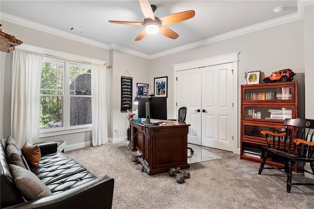 home office featuring ornamental molding, ceiling fan, and light colored carpet