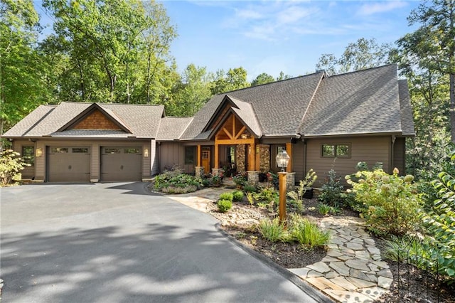 craftsman inspired home with a garage