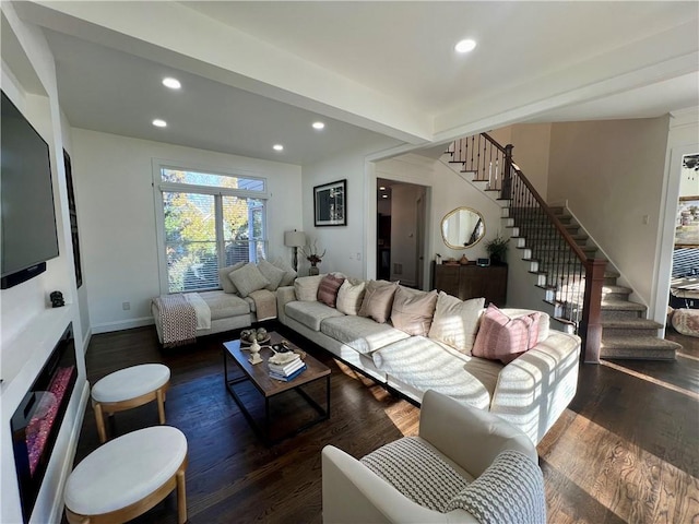 living room with dark hardwood / wood-style floors