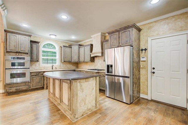 245 Ashley Forest Dr, Fayetteville, GA 30214 - back of property with a shed, a deck, stucco siding, a chimney, and an outdoor structure