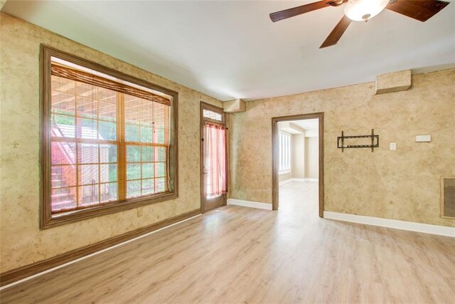 245 Ashley Forest Dr, Fayetteville, GA 30214 - carpeted spare room with decorative columns, a ceiling fan, arched walkways, crown molding, and baseboards