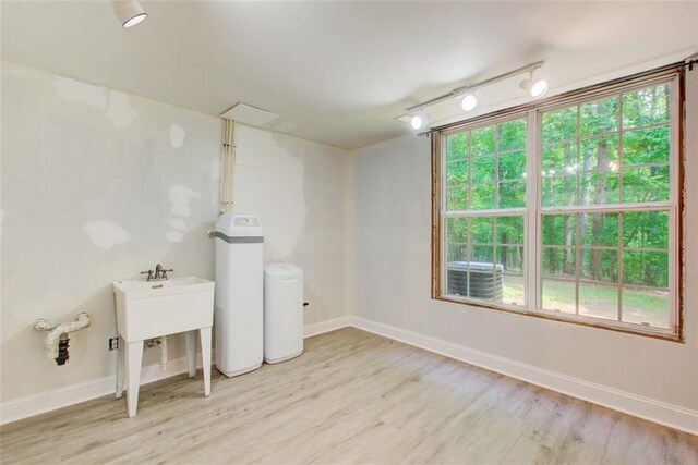 245 Ashley Forest Dr, Fayetteville, GA 30214 - empty room with decorative columns, crown molding, a ceiling fan, carpet, and arched walkways