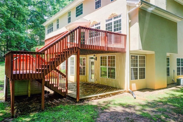 245 Ashley Forest Dr, Fayetteville, GA 30214 - wooden deck featuring stairway and central AC unit