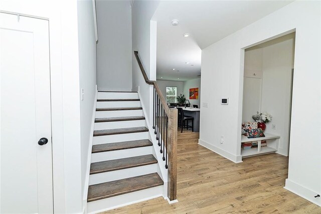 1433 Halpern Ln, Kennesaw, GA 30144 - stairs with baseboards, wood finished floors, and recessed lighting