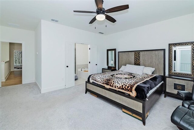 1433 Halpern Ln, Kennesaw, GA 30144 - carpeted bedroom with baseboards, ceiling fan, visible vents, and ensuite bathroom