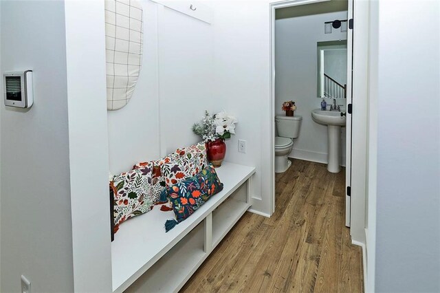 1433 Halpern Ln, Kennesaw, GA 30144 - bathroom with a sink, baseboards, toilet, and wood finished floors