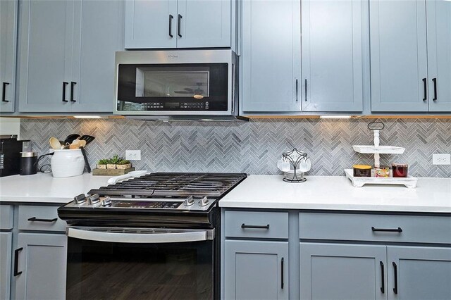 1433 Halpern Ln, Kennesaw, GA 30144 - kitchen with gray cabinetry, light countertops, and stainless steel appliances