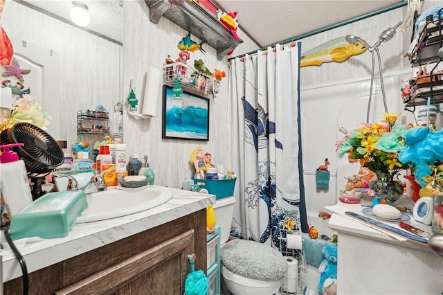 bathroom with vanity, a shower with curtain, and toilet