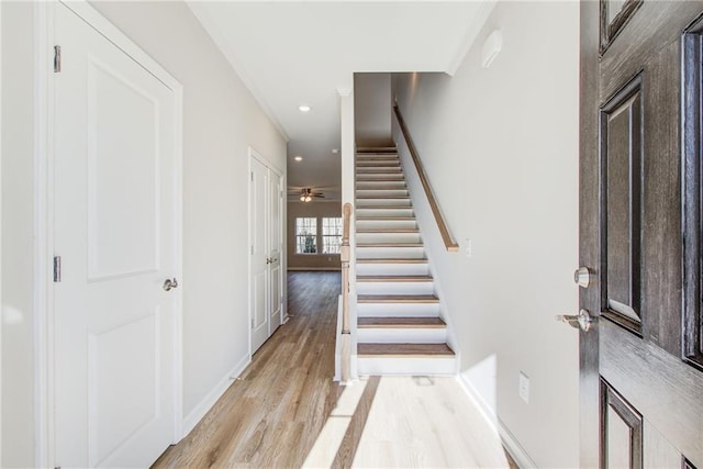 93 Portico Pl, Newnan, GA 30265 - stairs with wood finished floors, crown molding, and recessed lighting