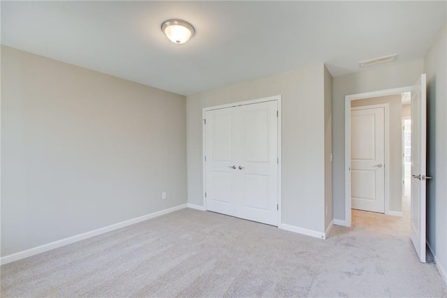 93 Portico Pl, Newnan, GA 30265 - unfurnished bedroom with light carpet and a closet