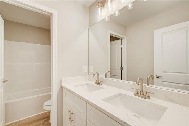 93 Portico Pl, Newnan, GA 30265 - bathroom with double vanity and wood finished floors