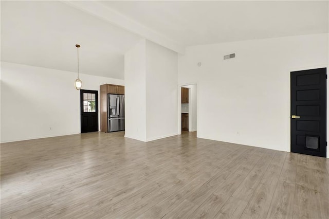 215 Maplewood Dr SW, Calhoun, GA 30701 - unfurnished room featuring light wood-type flooring and high vaulted ceiling