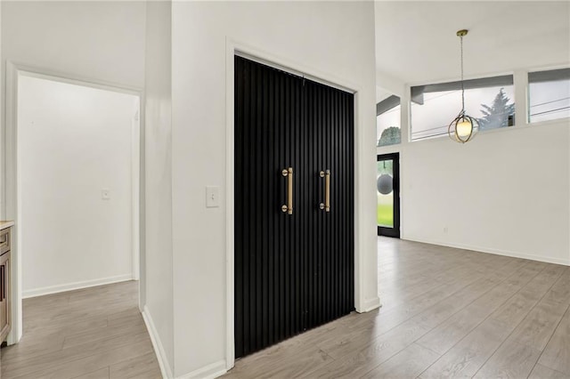 215 Maplewood Dr SW, Calhoun, GA 30701 - hallway with light wood-style flooring and baseboards