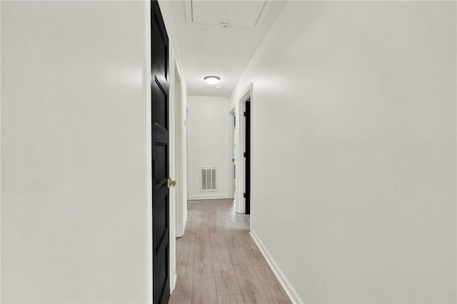 215 Maplewood Dr SW, Calhoun, GA 30701 - corridor with attic access, light wood-style flooring, and baseboards