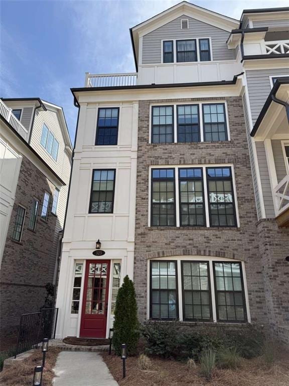 view of front of property with brick siding