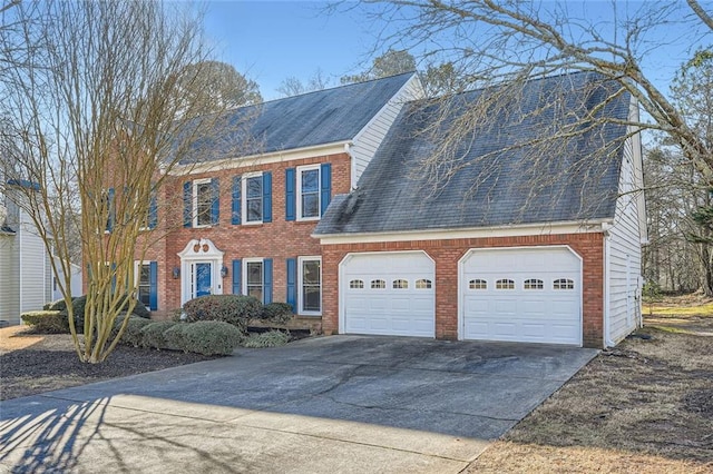 colonial home featuring a garage