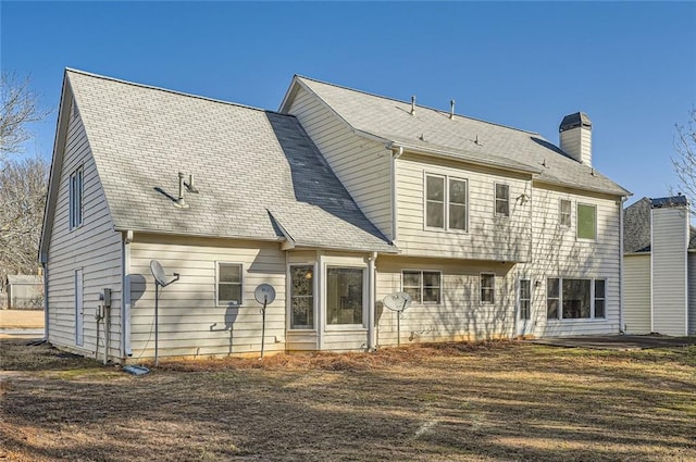 back of house featuring a patio