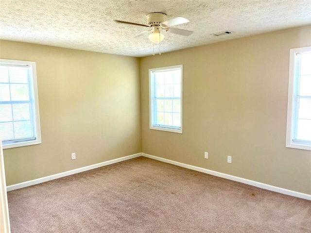2124 Hickory Bnd SE, Conyers, GA 30013 - empty room with ceiling fan, carpet, and a textured ceiling