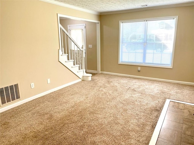 2124 Hickory Bnd SE, Conyers, GA 30013 - carpeted spare room featuring crown molding, stairway, and a textured ceiling