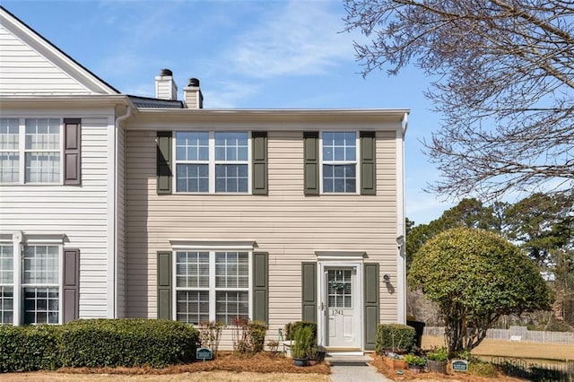 view of front of property featuring a chimney