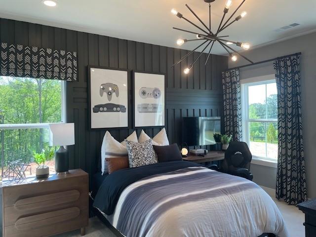 750 Keystone Dr, Woodstock, GA 30188 - bedroom with a chandelier and multiple windows