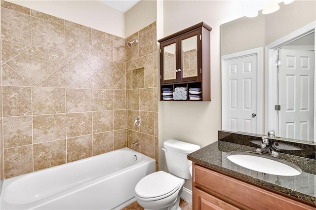 full bath featuring toilet, vanity, and bathing tub / shower combination