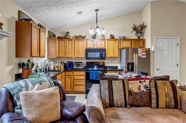kitchen with a sink, black appliances, vaulted ceiling, dark countertops, and a textured ceiling