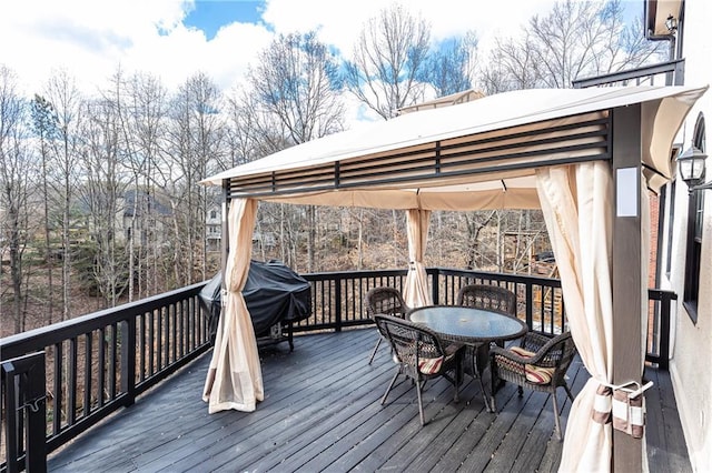 wooden terrace with a gazebo