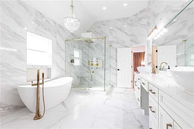 bathroom featuring vanity, vaulted ceiling, independent shower and bath, and tile walls