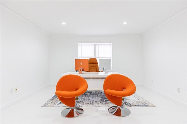 sitting room featuring crown molding