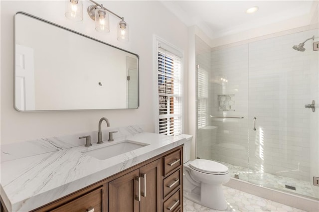 full bath with ornamental molding, a stall shower, vanity, and toilet