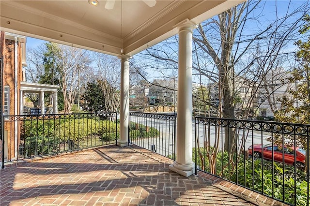 view of patio featuring a balcony