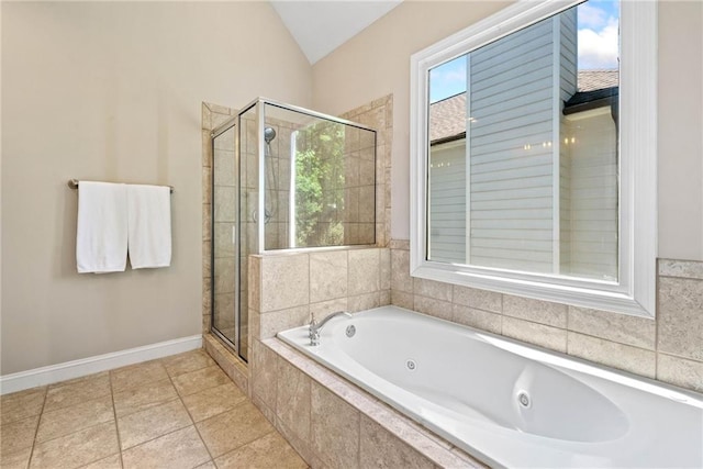 3232 Cates Ave NE, Brookhaven, GA 30319 - bathroom with a shower stall, lofted ceiling, healthy amount of natural light, a tub with jets, and baseboards