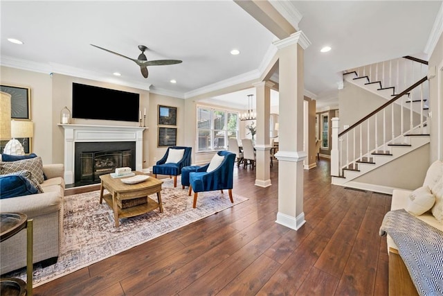 3232 Cates Ave NE, Brookhaven, GA 30319 - living room with ceiling fan, a fireplace with raised hearth, stairway, crown molding, and dark wood-style flooring