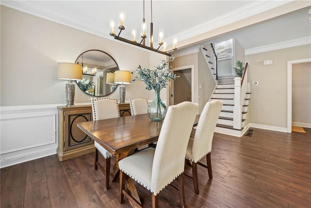 3232 Cates Ave NE, Brookhaven, GA 30319 - dining space featuring hardwood / wood-style flooring, crown molding, stairs, and a chandelier