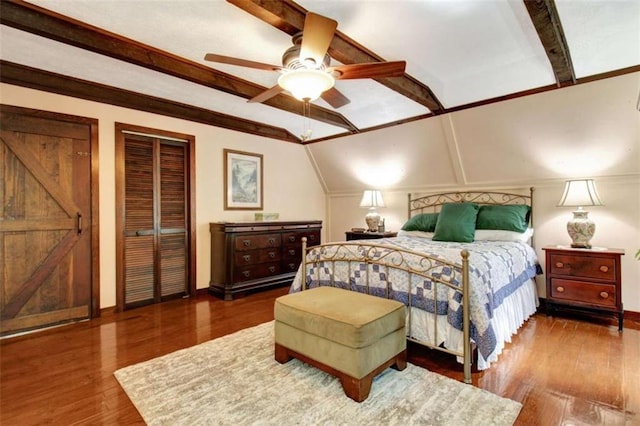 bedroom with ceiling fan, dark hardwood / wood-style floors, and lofted ceiling with beams