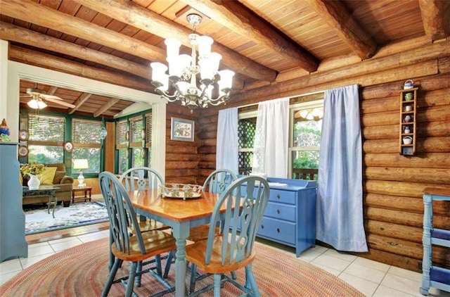 tiled dining space featuring rustic walls, wood ceiling, beam ceiling, and ceiling fan with notable chandelier