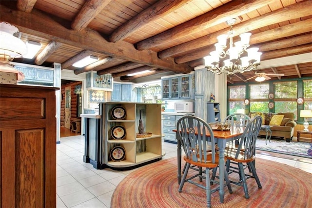 tiled dining area featuring wooden ceiling, an inviting chandelier, and beamed ceiling