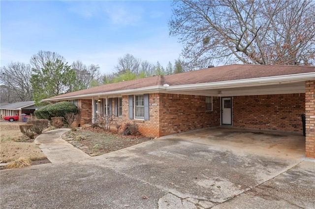 single story home with a carport