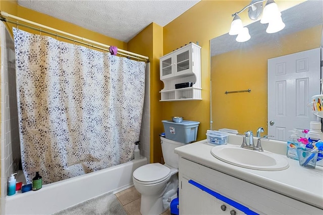 bathroom featuring a textured ceiling, tile patterned flooring, toilet, vanity, and shower / bath combination with curtain